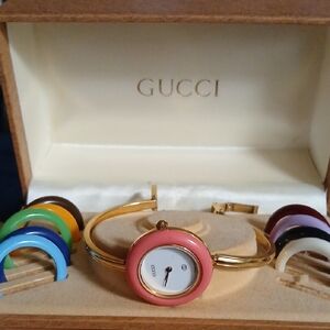 Gucci Women's Pink and Gold Watch with Colorful Bangles